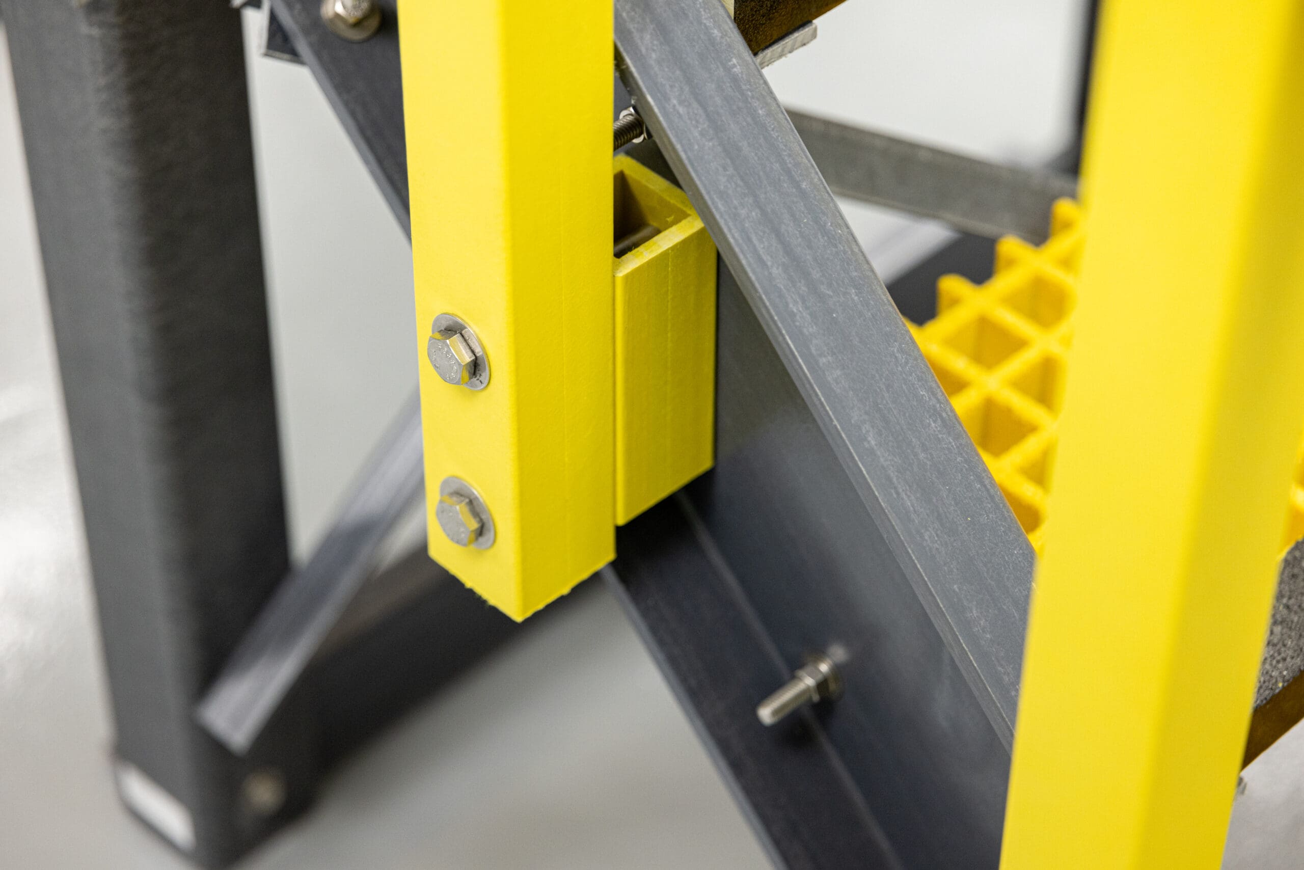 Close-up of yellow ReadyRail connection to ReadyStairs