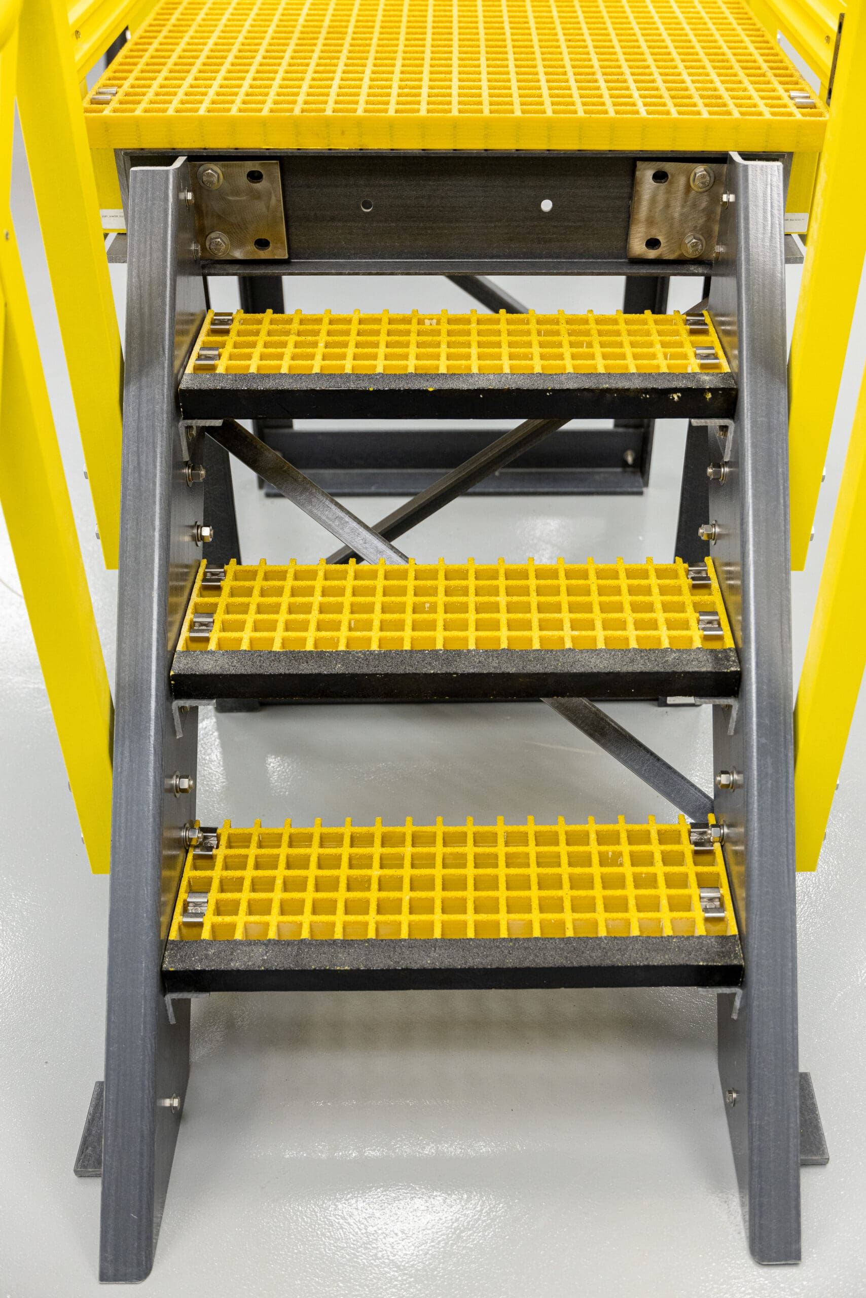 Yellow ReadyStairs steps with ReadyPlatform and ReadyRail products