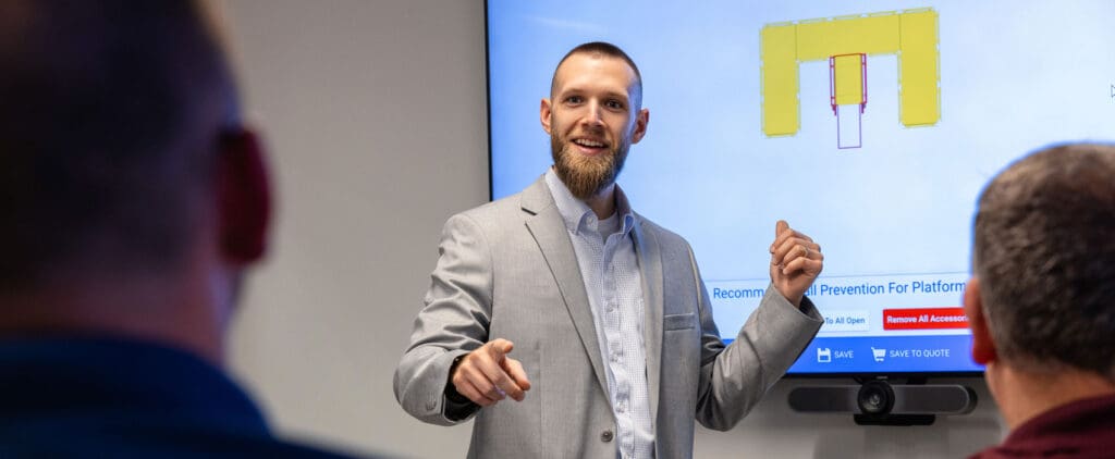 Man showing OSCO ReadySeries 3D Configurator Tool to audience