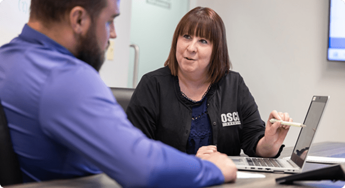 Woman helping a customer