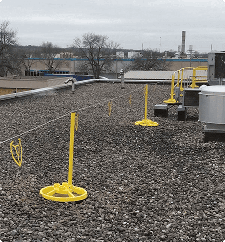 Visual warning lines being used on a rooftop