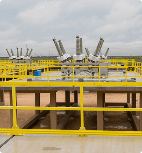 Safety railings around an electrical facility