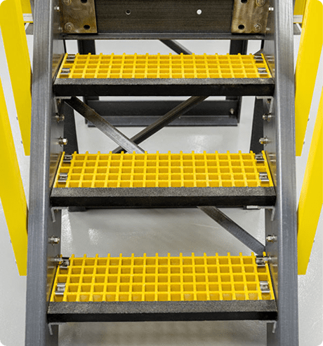 Stair treads attached to molded grating stairs