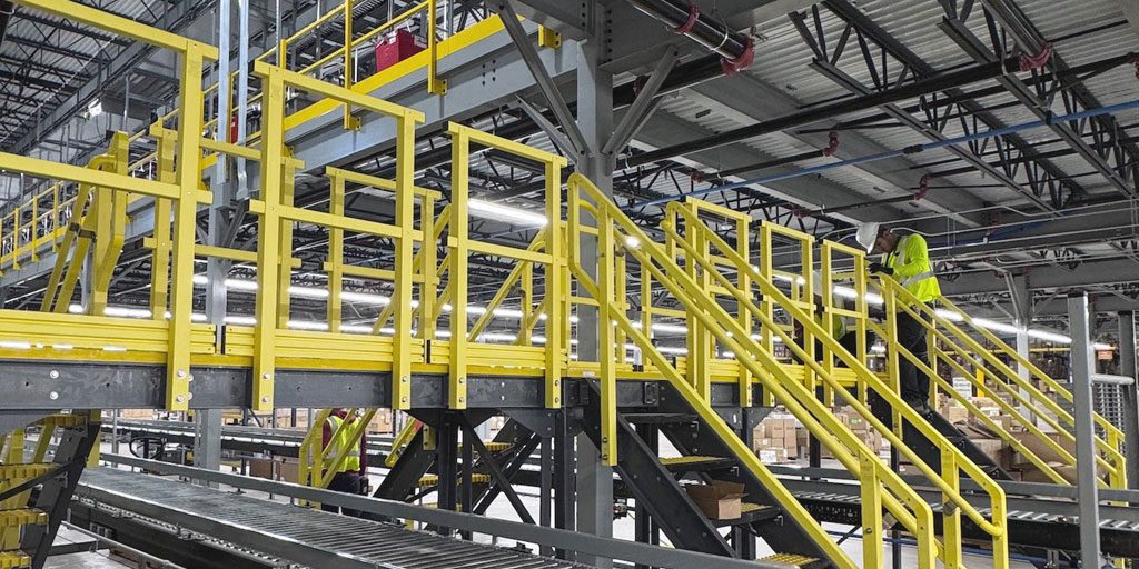 Yellow, modular ReadySeries platform in warehouse facility.